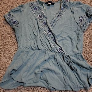 Light blue summer top with floural design